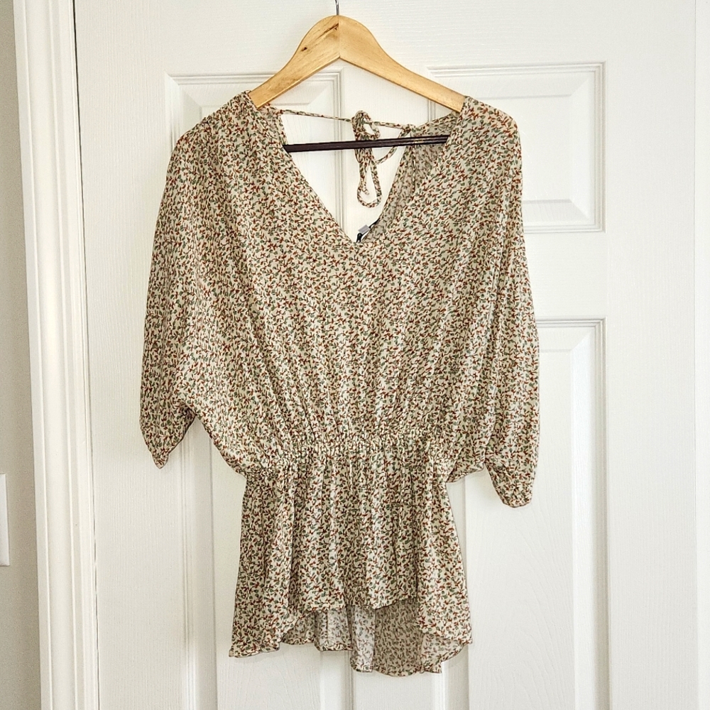 White Birch back tie peplum top